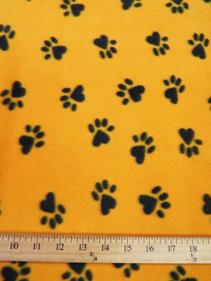 Fleece Printed Fabric Animal Paw / Yellow/Black Paws / Sold By The Yard